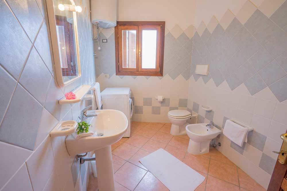 Residence Baia Sant Anna Con Piscina Танаунелла Экстерьер фото