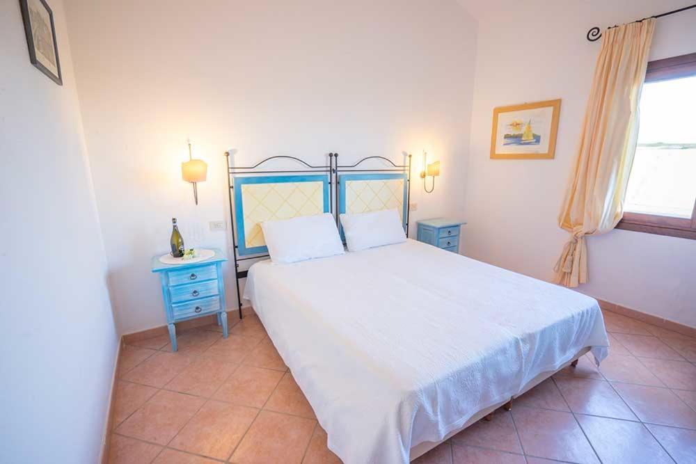 Residence Baia Sant Anna Con Piscina Танаунелла Экстерьер фото