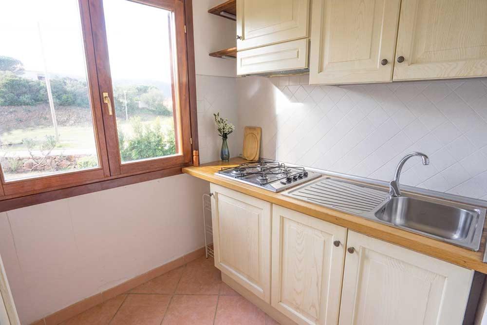 Residence Baia Sant Anna Con Piscina Танаунелла Экстерьер фото