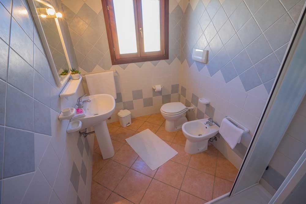 Residence Baia Sant Anna Con Piscina Танаунелла Экстерьер фото