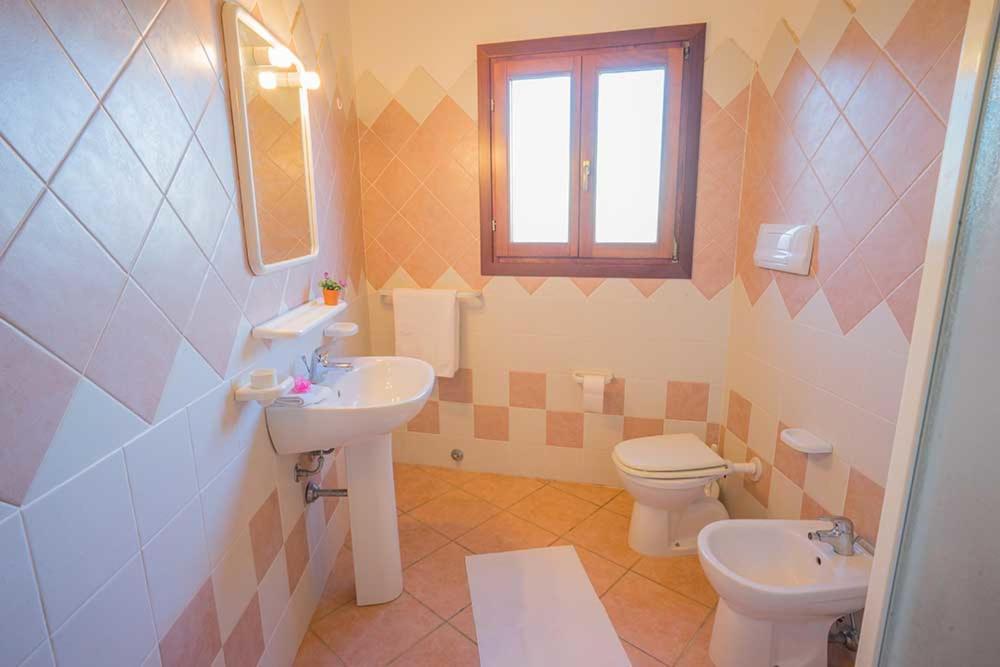 Residence Baia Sant Anna Con Piscina Танаунелла Экстерьер фото